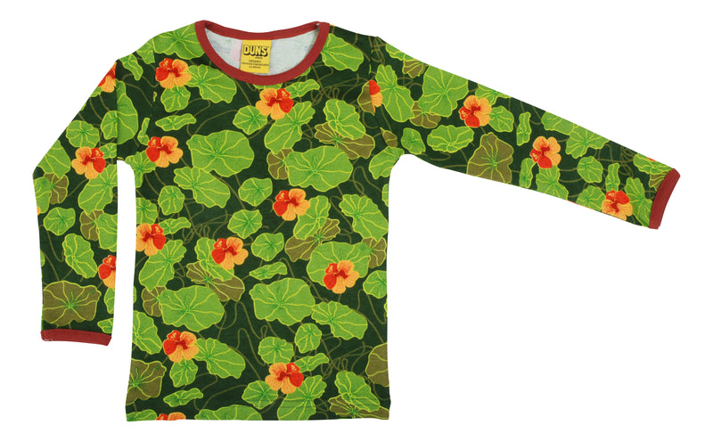 duns sweden organic cotton long sleeve top in monks crfest print which is a green leafy print with orange/red flowers
